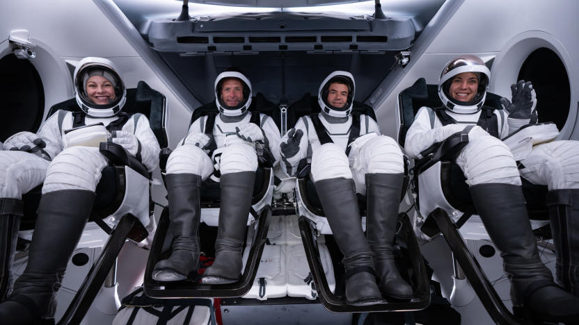 The four Polaris Dawn crew members in their spacesuits in the Dragon capsule during tests ahead of the flight