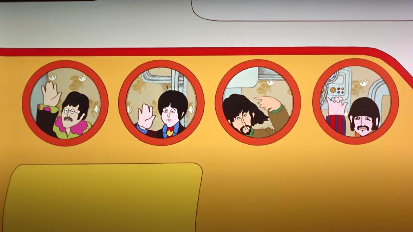 The Beatles waving goodbye.